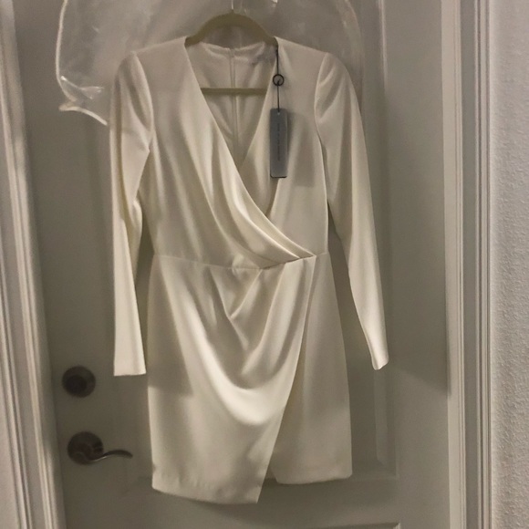 Black Halo Dresses & Skirts - Black Halo cream color dress, beautifully lined flattering cut for all figures.